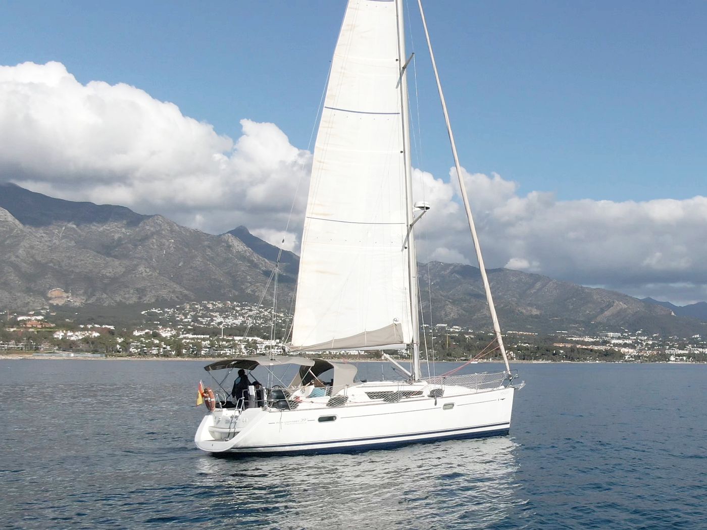 Nirvana, a Dufour 455 sailing yacht, under way off Puerto Banús, Marbella